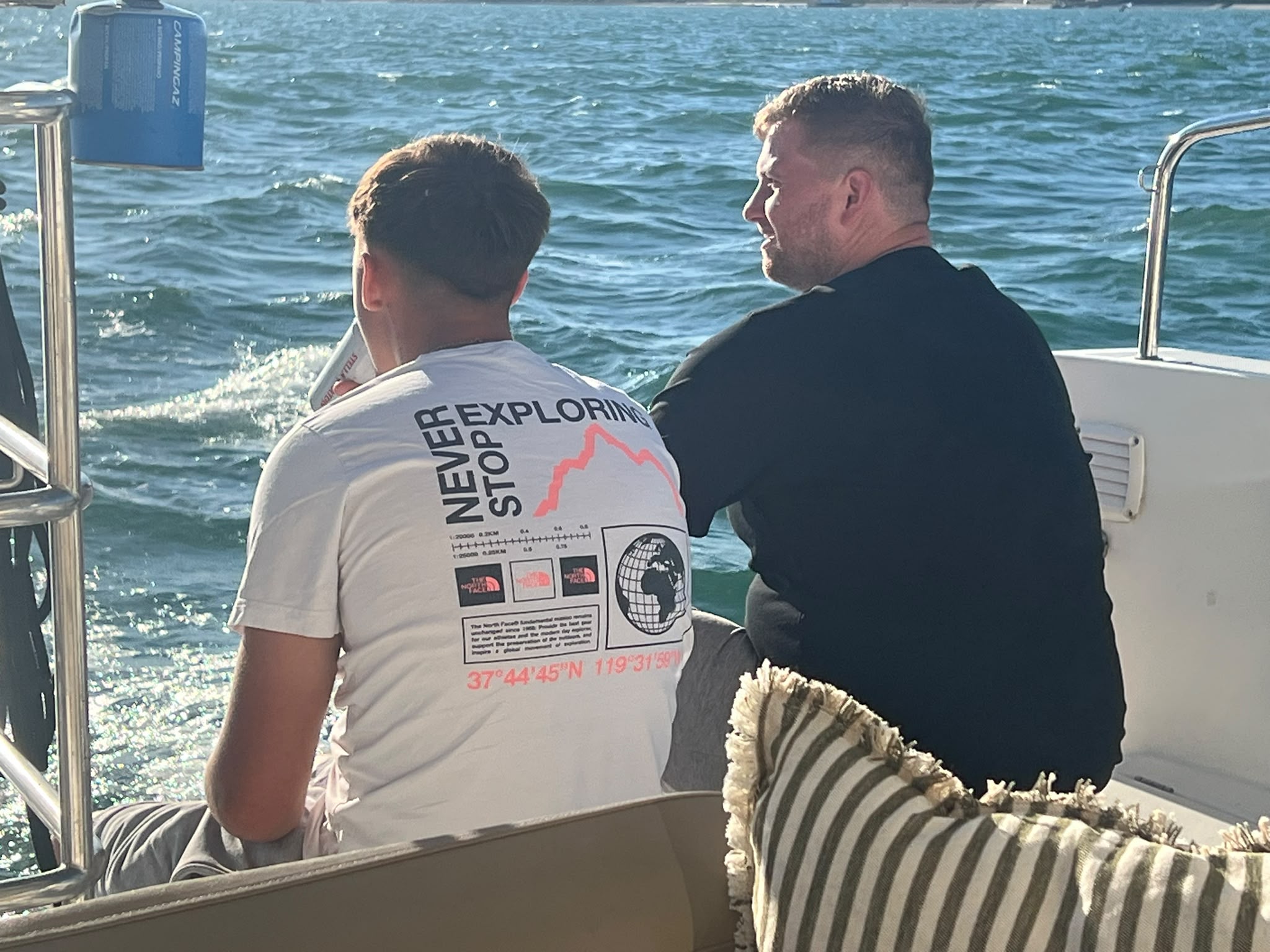 Guests chatting on deck