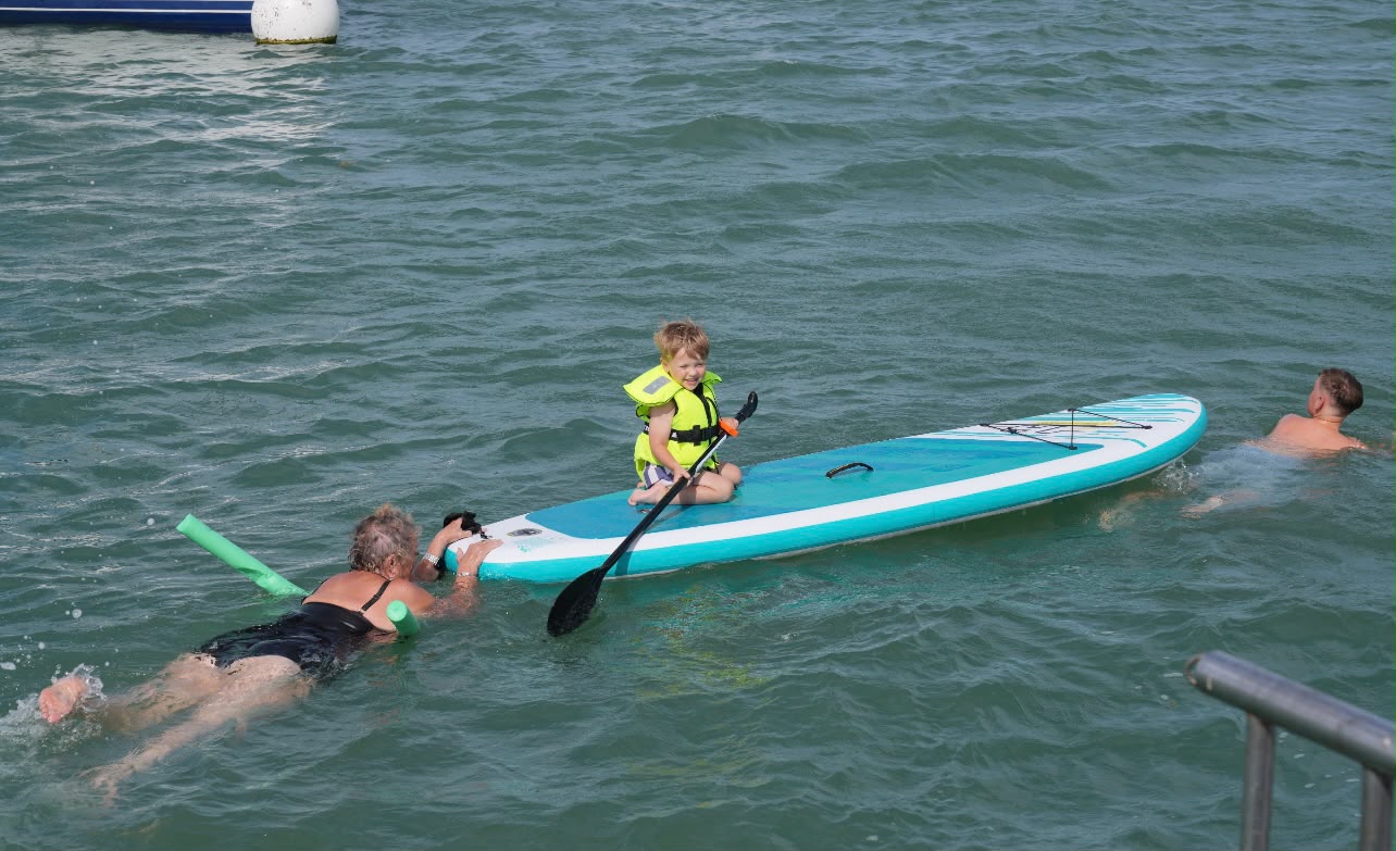 Paddleboarding and swimming at anchor