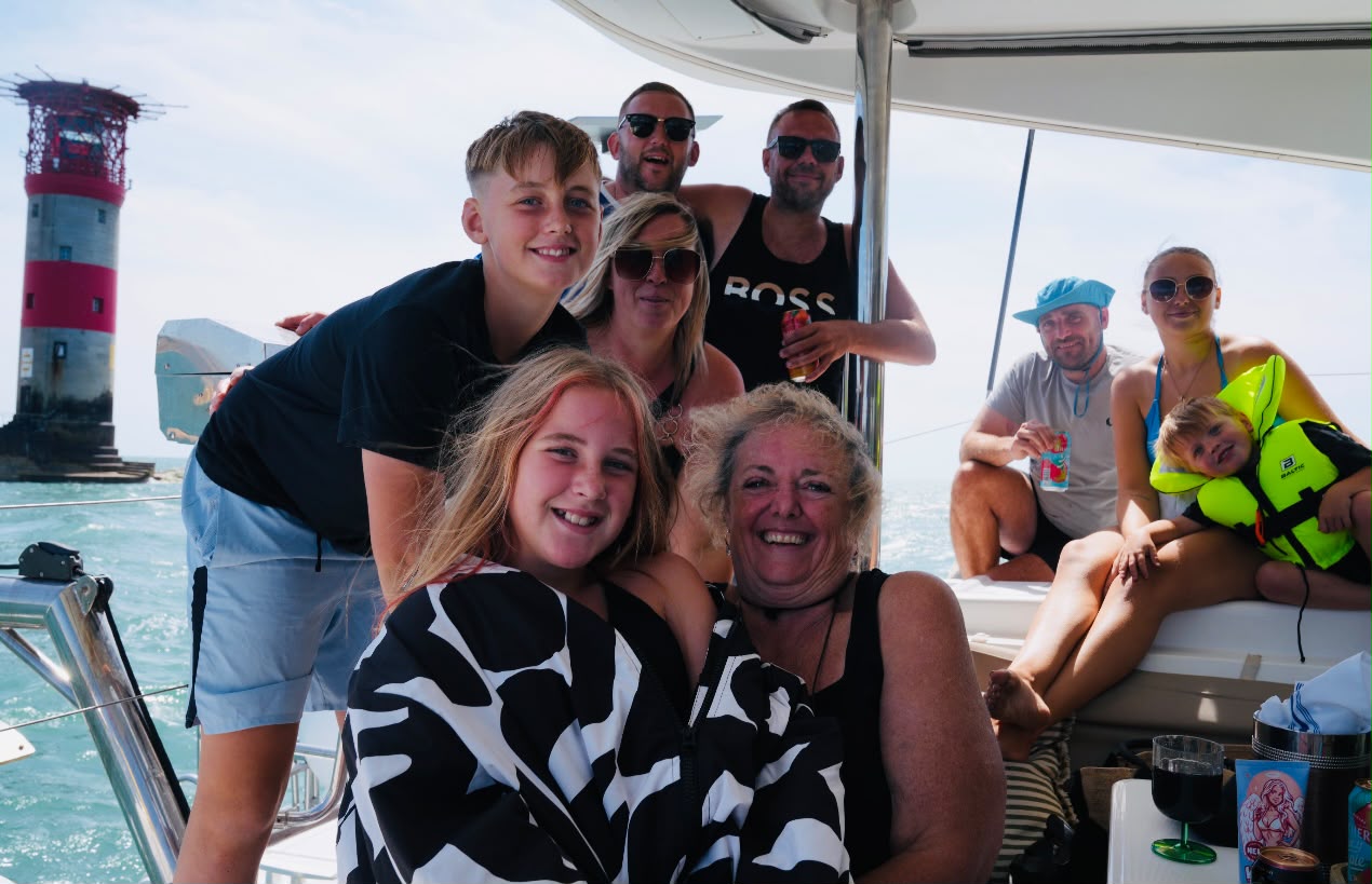 Family gathering aboard RaRa near the Needles