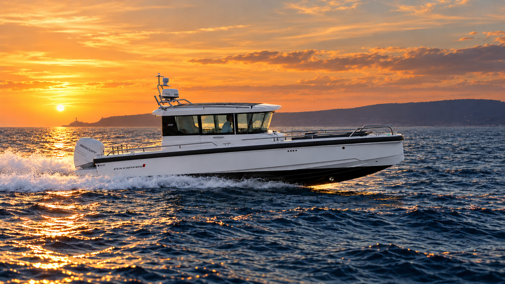 Axopar 28 sports boat underway on the Solent at sunset
