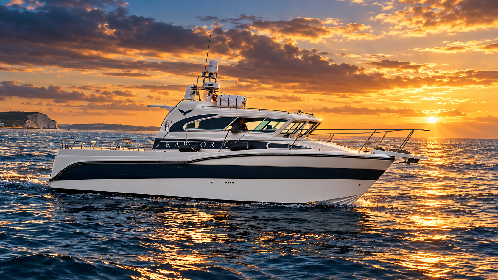 Raptor fishing charter boat on the Solent in golden sunset light